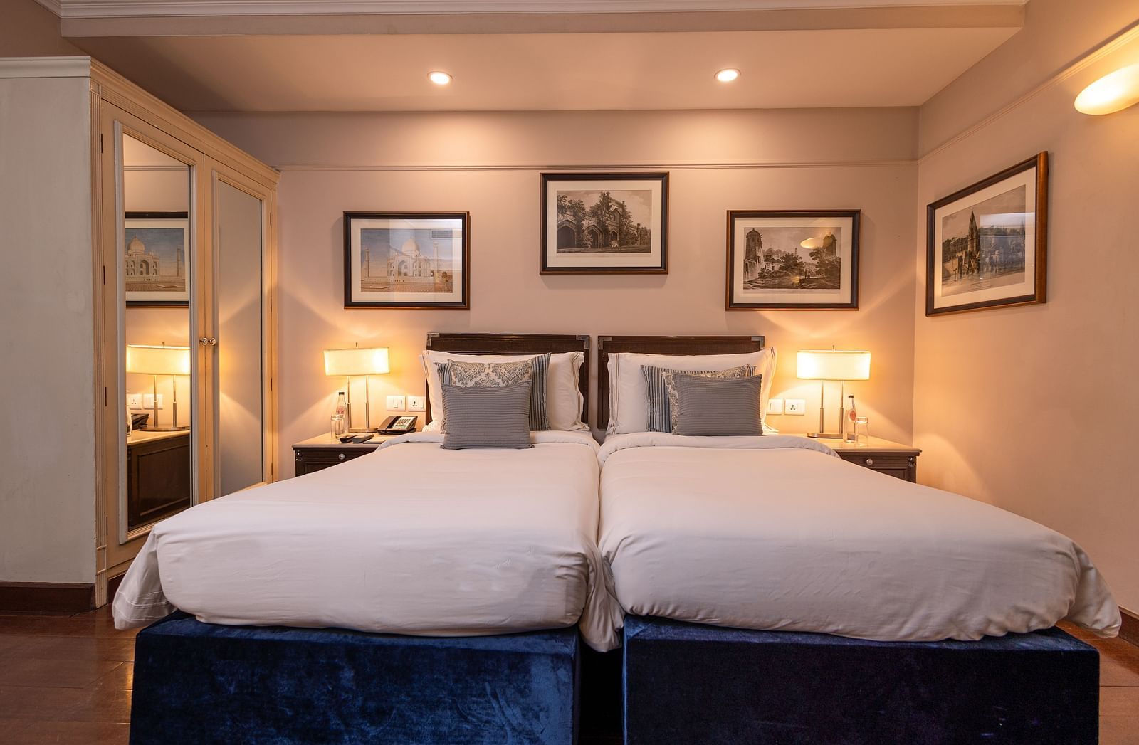 Front view of the Superior Twin Bed Room at The Claridges New Delhi, highlighting twin beds with bedside lamps