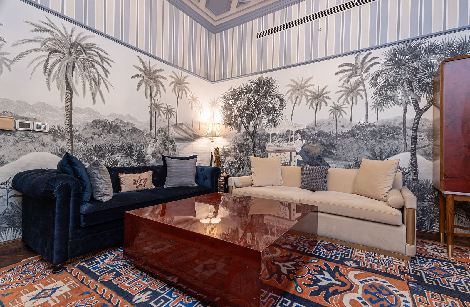 image of the living area in the heritage parlour suite with two couch and a centre table - The Claridges New Delhi