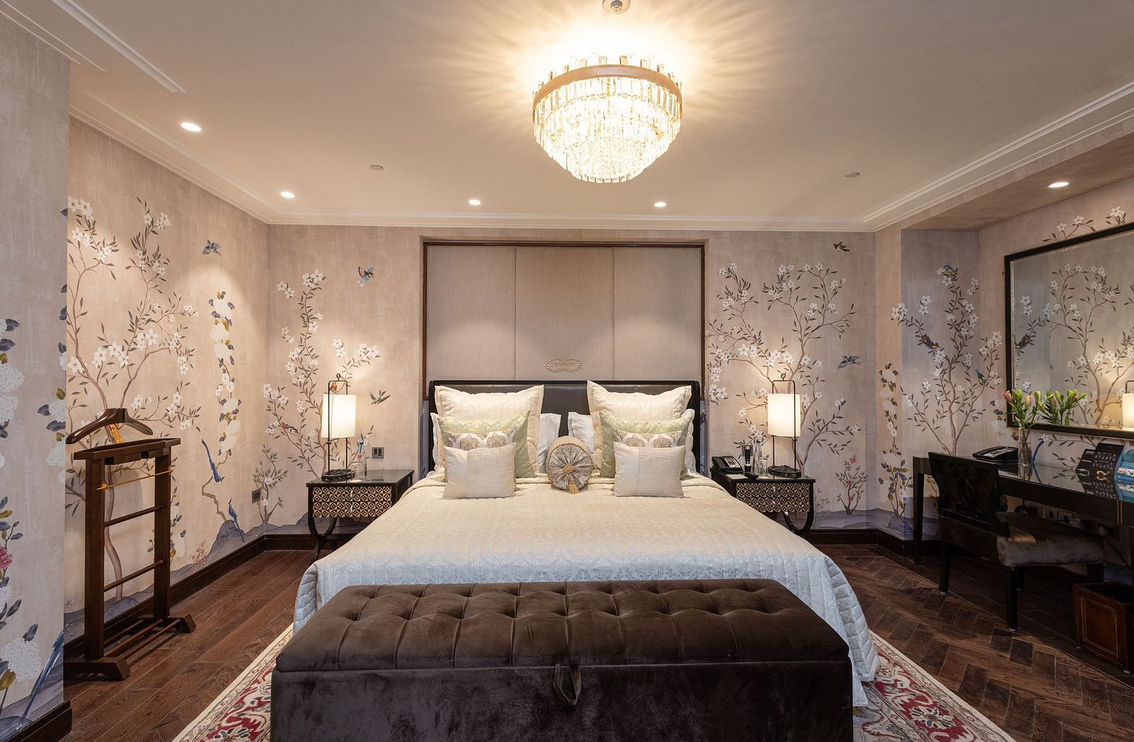 image of a bedroom with classy and elegant interiors featuring a king size bed at the cabana room - The Claridges New Delhi