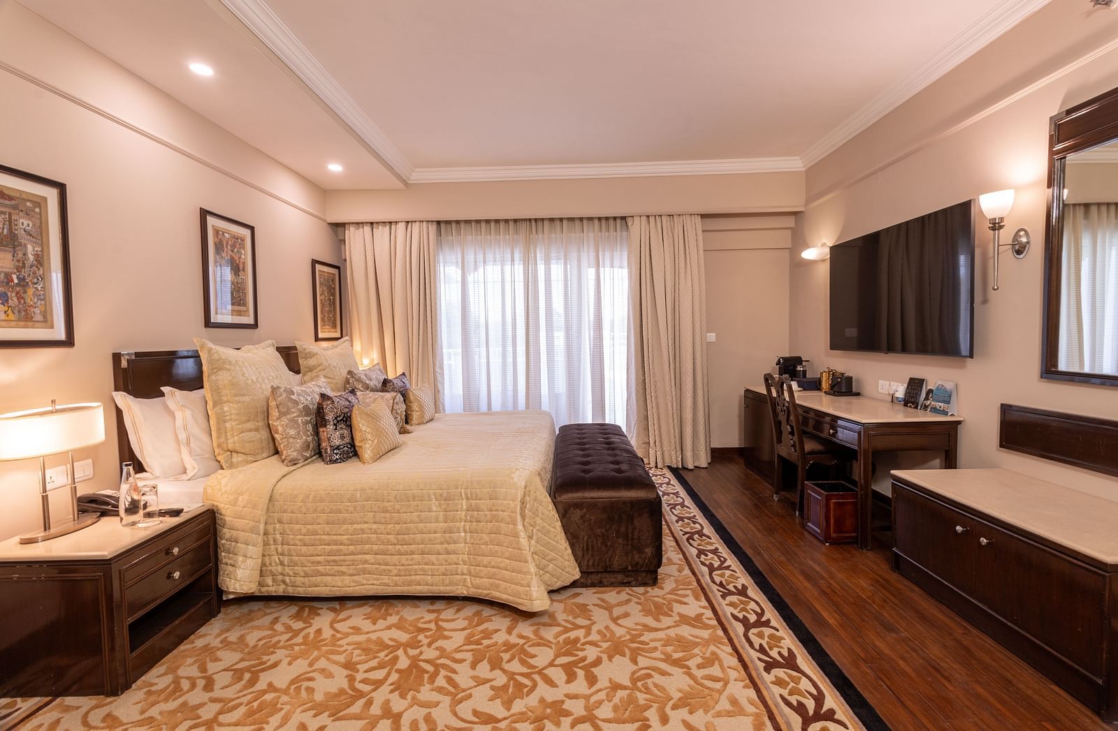 image of a spacious and an elegant bedroom of the heritage terrace room - The Claridges New Delhi