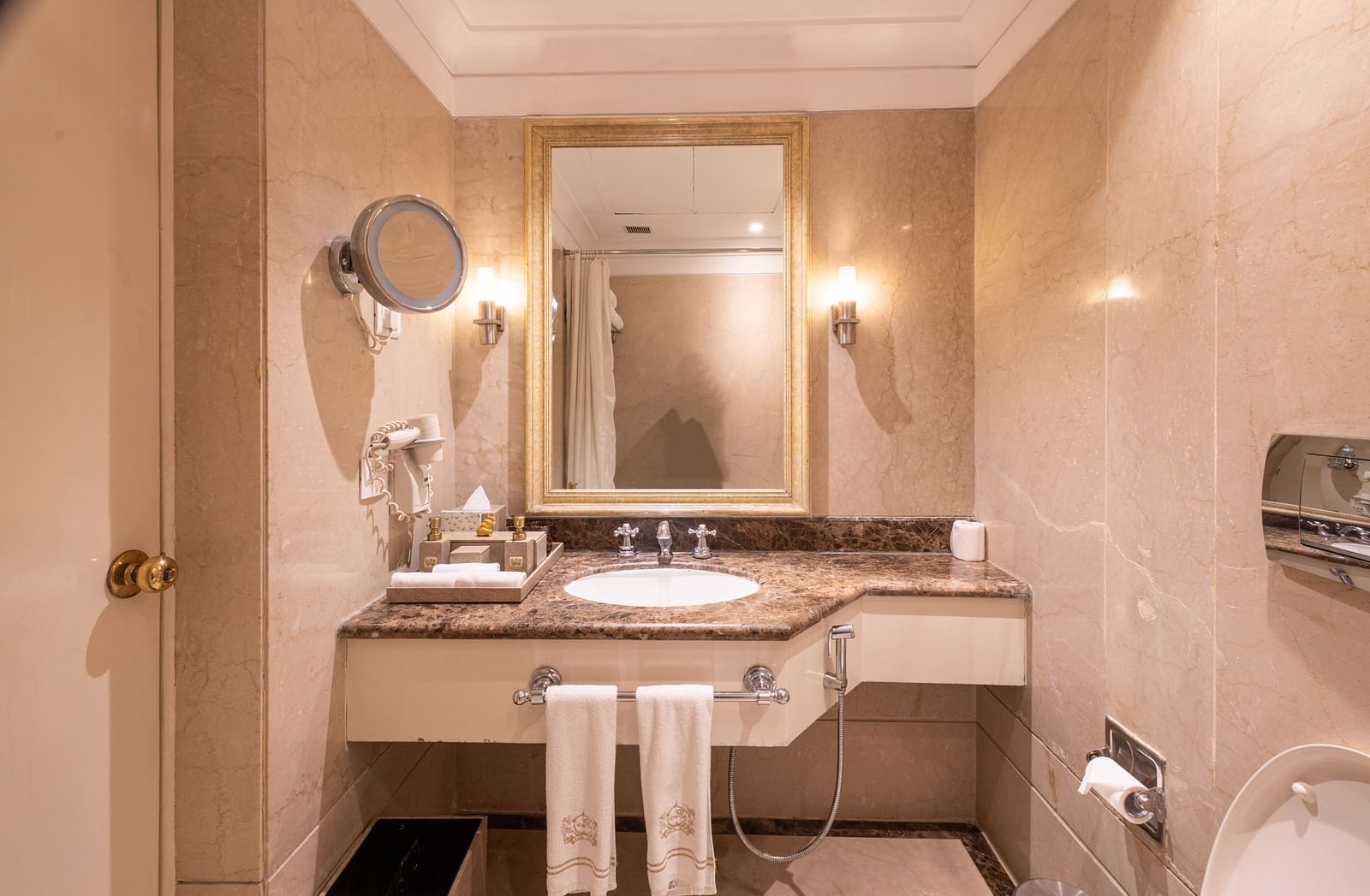 image of the sink with a rectangular shaped mirror above it at the heritage terrace room
