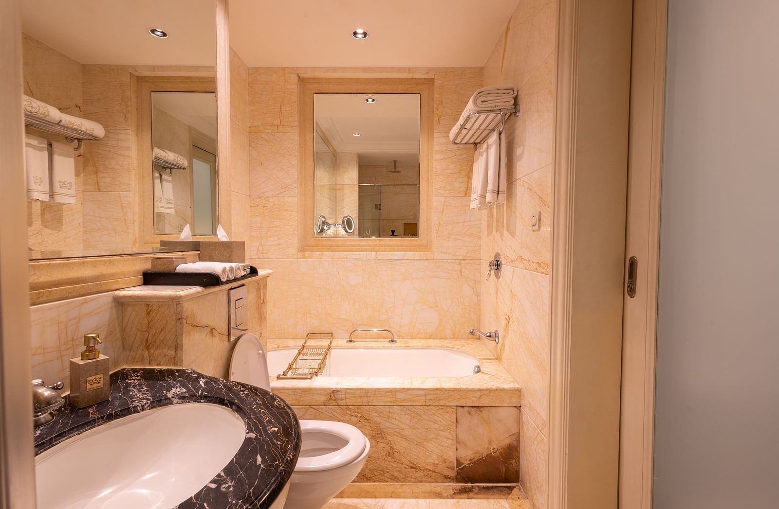 image of a well appointed bathroom with all necessary amenities at our heritage room bathrooms - The Claridges New Delhi