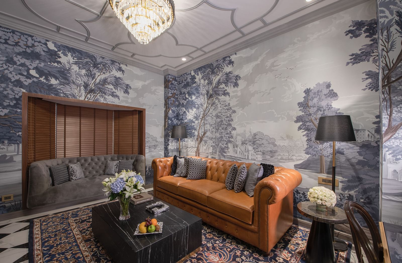 heritage Luxury Suite with sofas, lamp and a coffee table in the centre The Claridges, New Delhi