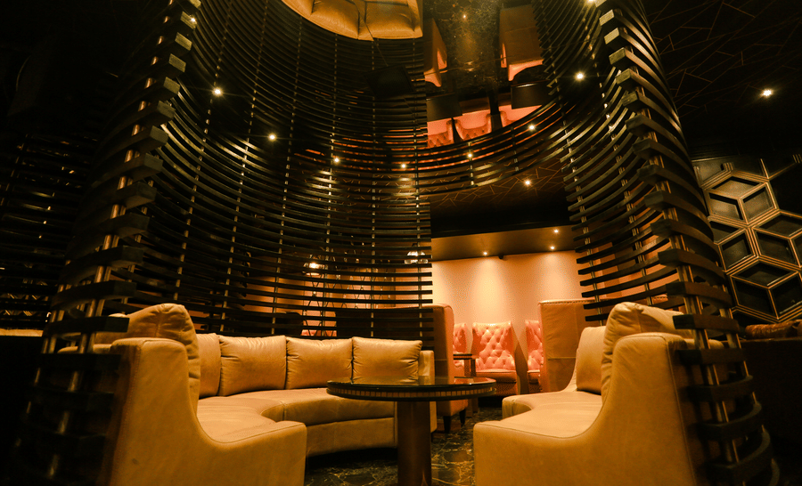 An overview of the seating arrangements inside the Lounge at Alchemy, our in-house bar in Chennai - Raj Park Hotel, Chennai.