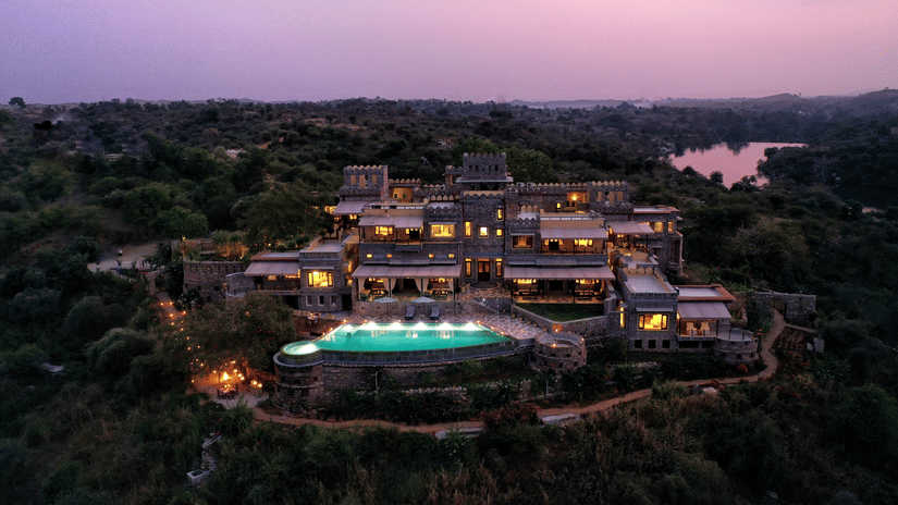 An aerial view from a drone of Chunda Shikar Oudi with the swimming pool in full view. 