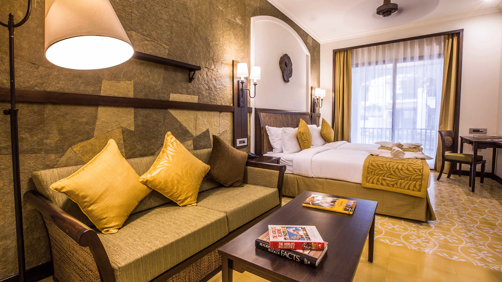 an image of a bedroom with white and gold interiors - Rhythm Lonavala