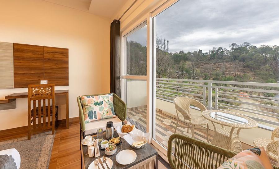 View of the mountains from the balcony of a room at Stone Wood Mountain Resort, Dharamshala