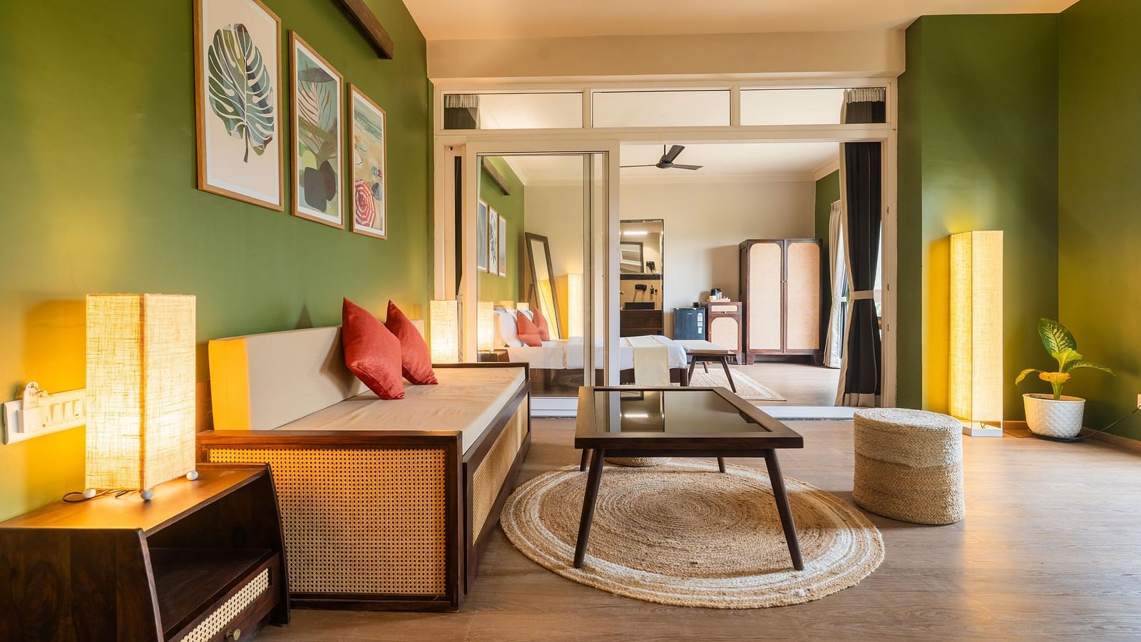 Open-plan suite with a cosy lounge, ambient lighting, and curated decor at Kssemya.