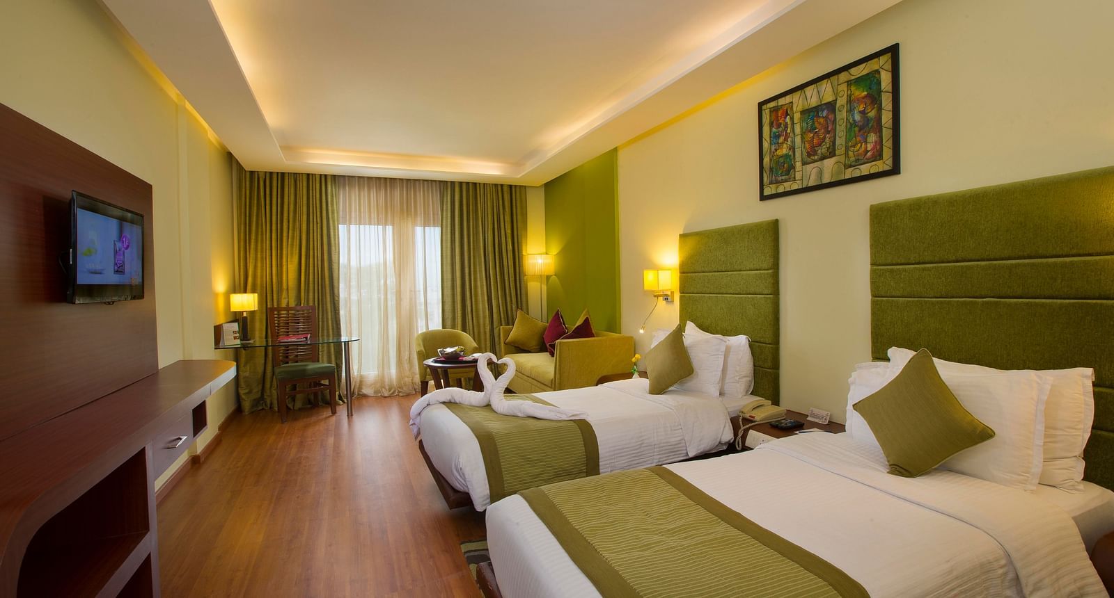 twin beds placed in Superior Room at Hotel Atithi - TGI Grand, Pondicherry