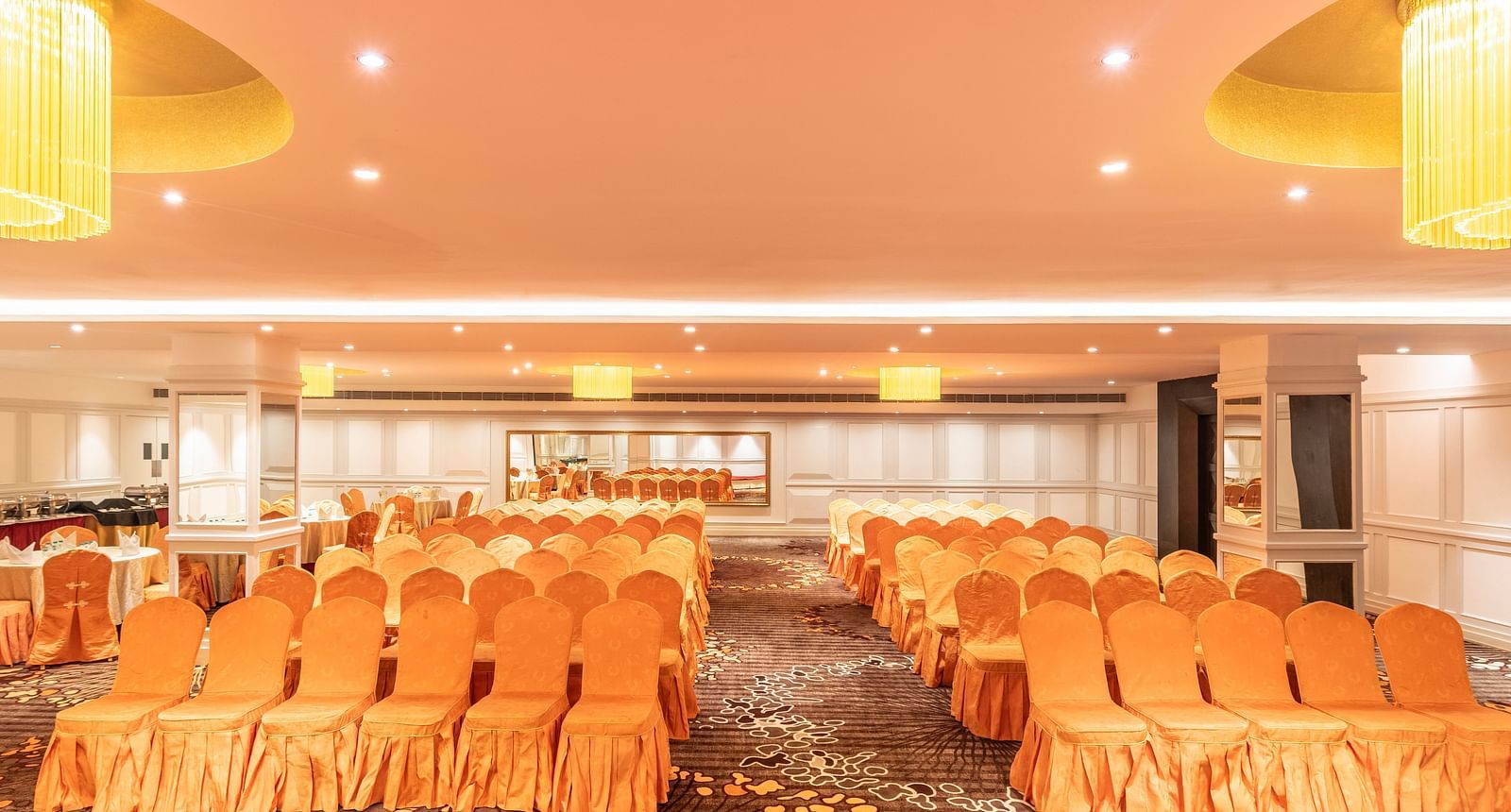 Conference space with theatre-style seating, suitable for corporate events or guest lectures