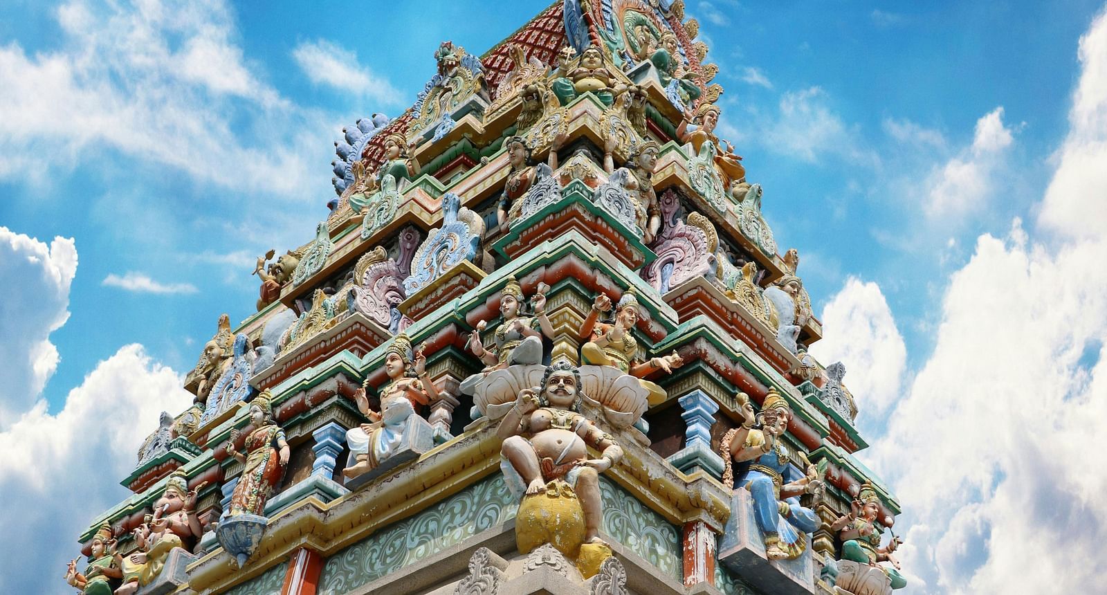 image of the top structure of a temple constructed in dravidian style of architecture