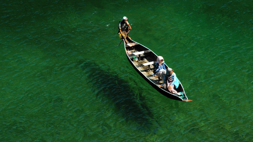a boat on crystal clear water 39