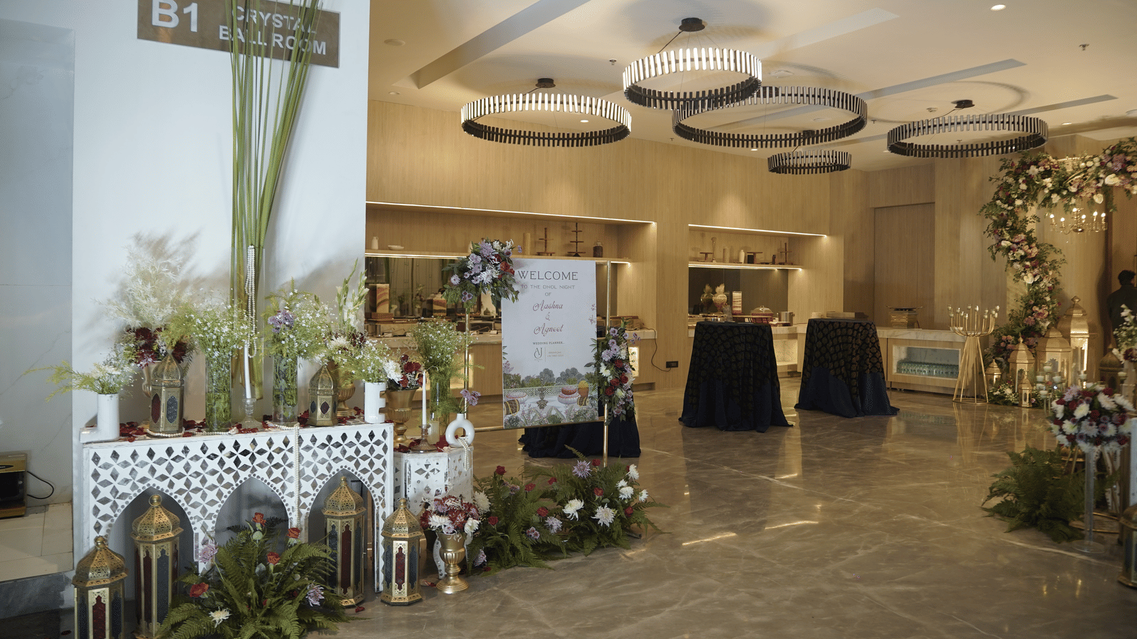 An area with seating, decorative elements, plants, and a reception-style layout designed to welcome guests at Ramada Encore by Wyndham Chandigarh Zirakpur.