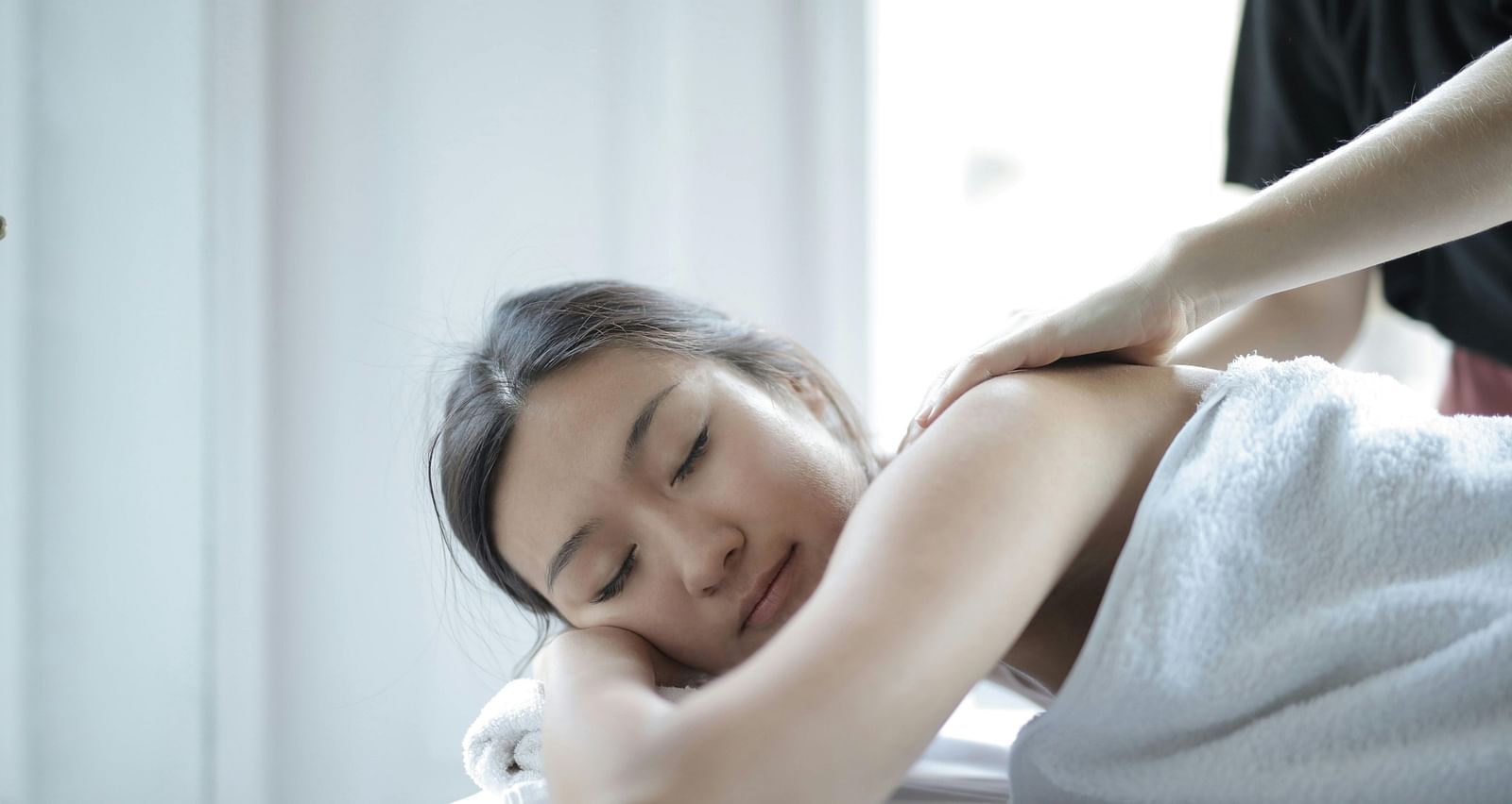 An image of a body treatment at the spa where a women is rejuvenating with the treatment