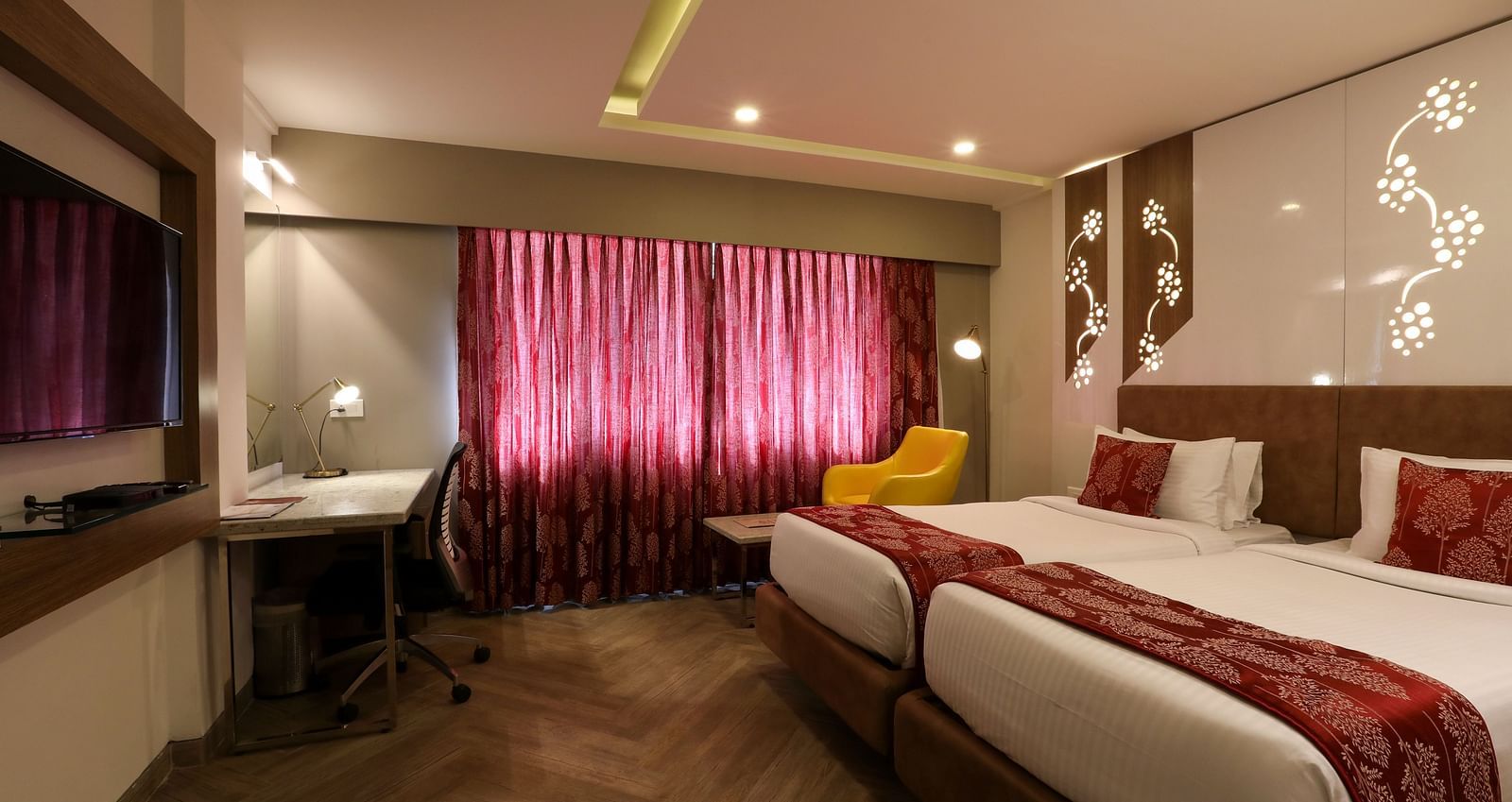 A bedroom with two single beds and a workdesk and chair - Mango Hill Central, Chennai