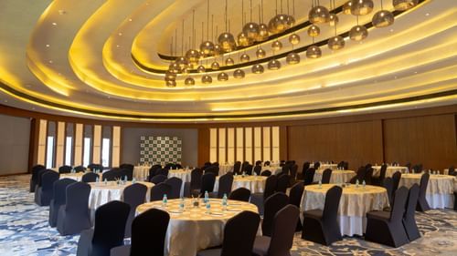 Cluster style seating arrangement in a banquet hall at Ananta Spa and Resort, Ajabgarh