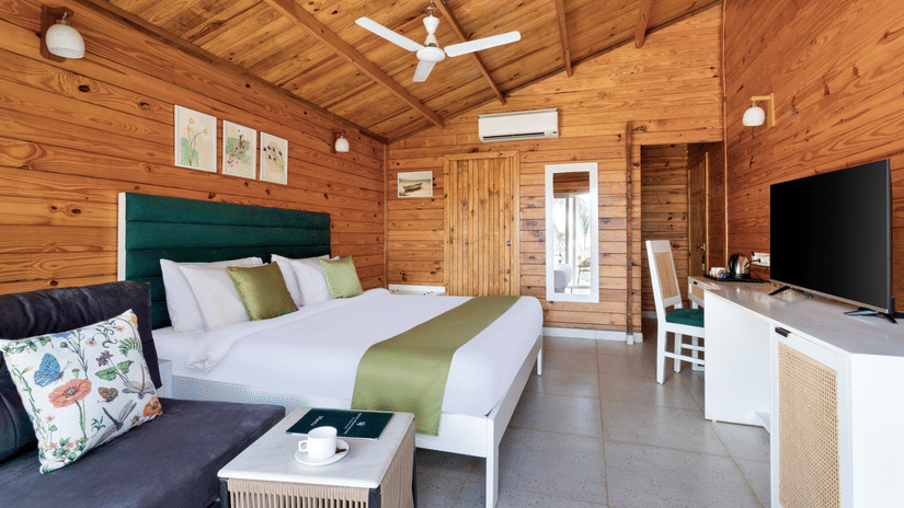 Lawn-view room featuring a cozy bed and air conditioning at Aralea Beach Resort by Stone Wood, Morjim