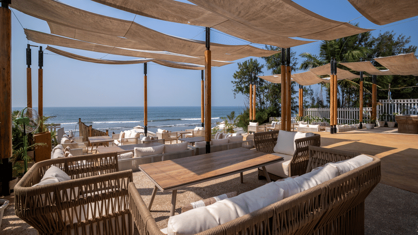 A full view of the In-House Restaurant at sibaya beach resort, morjim beach with covered seating arrangements