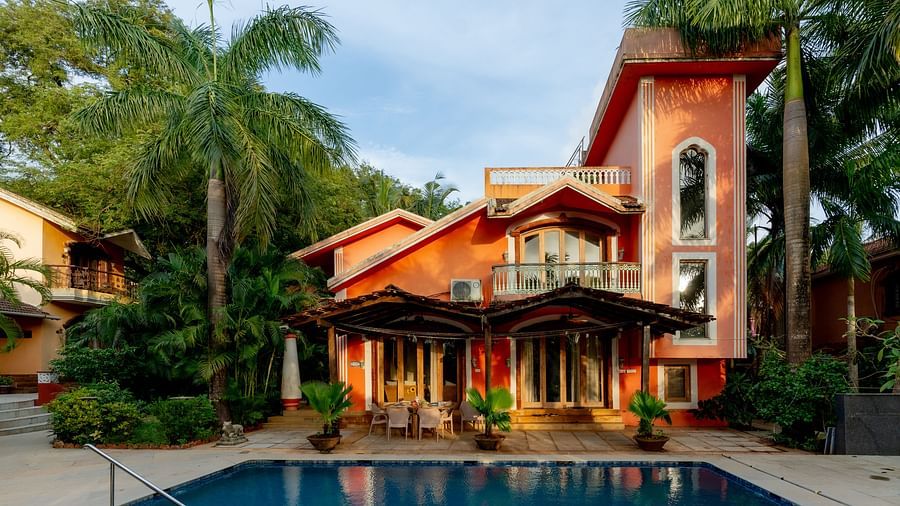 Image featuring the facade of Casa Arya Villa, Candolim with a pool in front of it