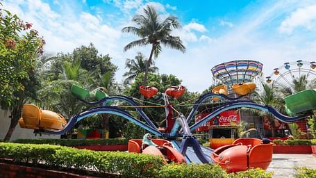 Spider Spin ride featuring legs of a huge spider at MGM Dizzee World which have seats and at the centre there is a controller which spins the entire ride.