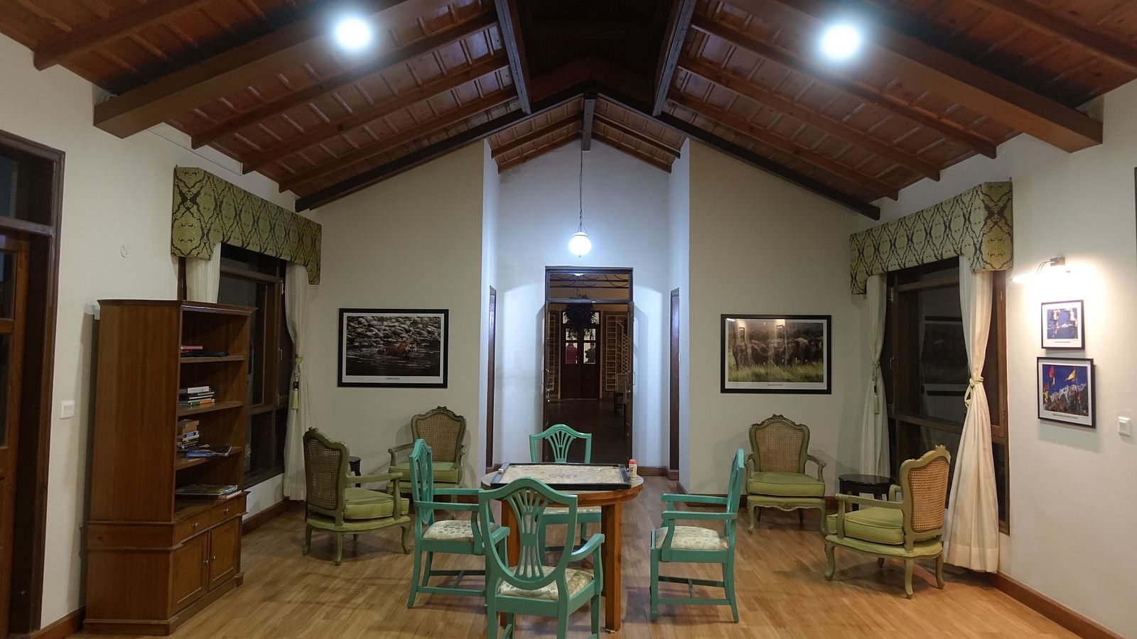 A table surrounded by chairs in our brightly-lit recreational room - BluSalzz Escapade - Anant Rasa Resort