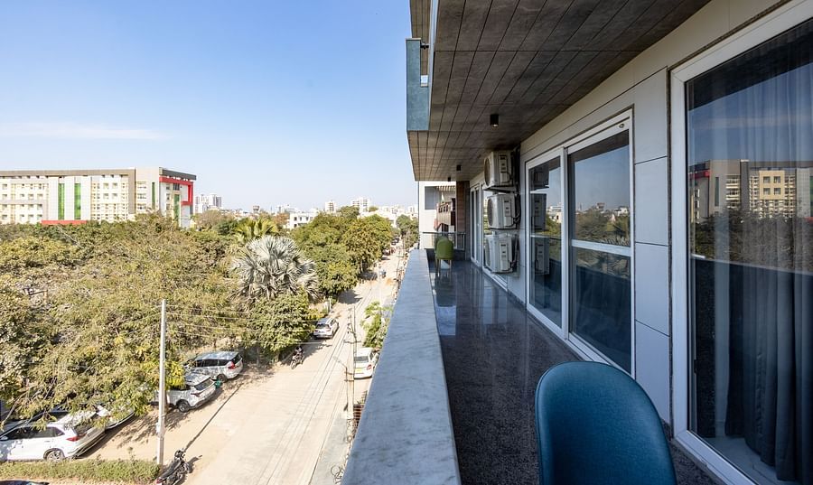 A balcony offering a cityscape at Hotel Bawa, Gurgaon.