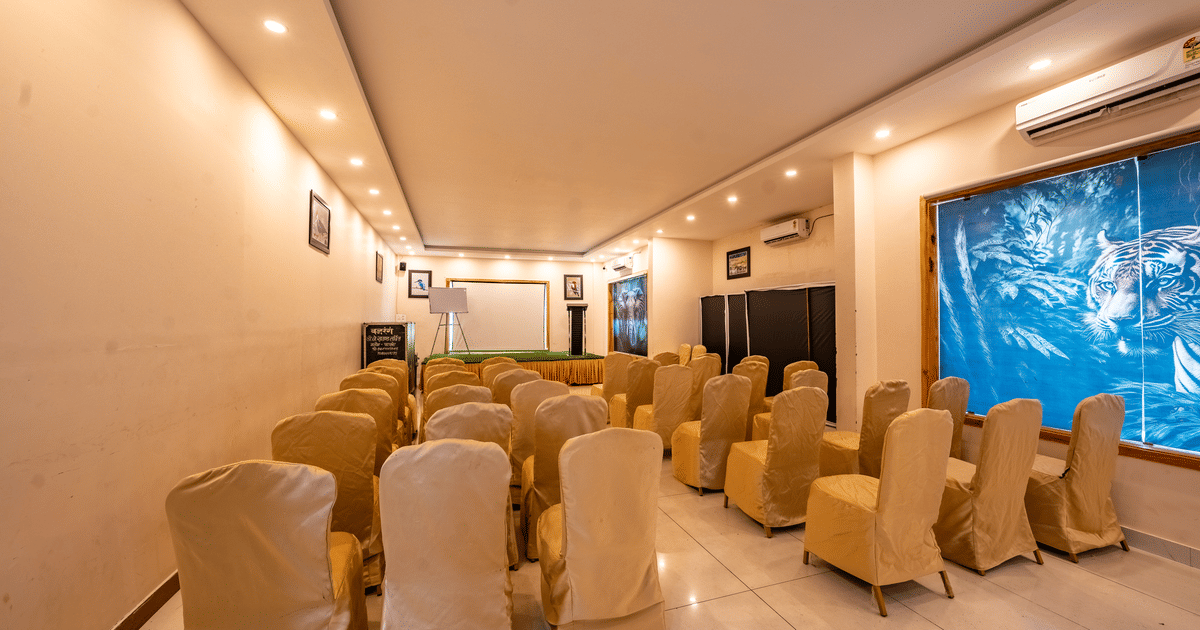 Banquet Hall at Corbett Nirvana with classroom setup and stage