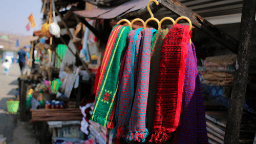 Colourful scarves hanging at a clothes shop