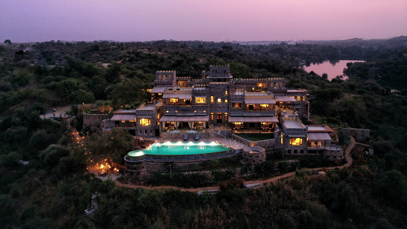 An aerial view from a drone of Chunda Shikar Oudi with the swimming pool in full view. 