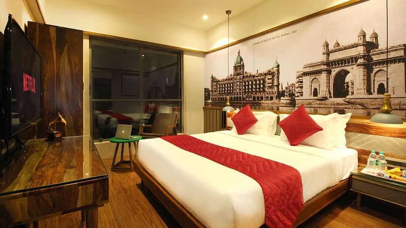 2 bedroom suite with an expansive window overlooking the city in khar