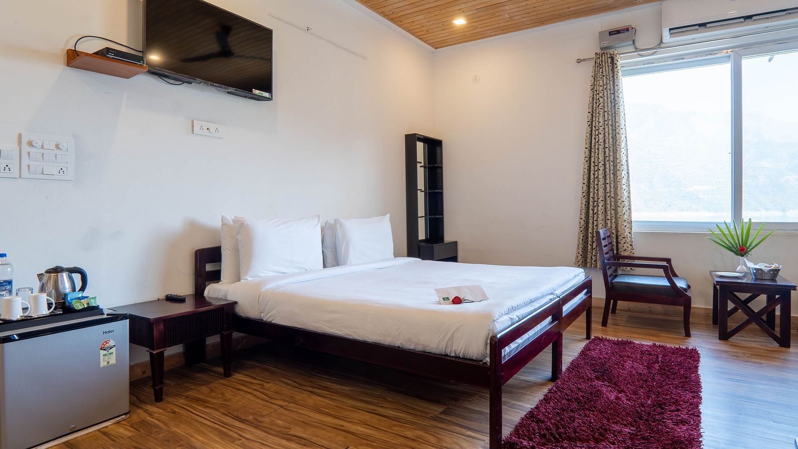 Family Room On Land closeup view of posh bedding and white duvet - Le ROI Floating Huts Eco Rooms5