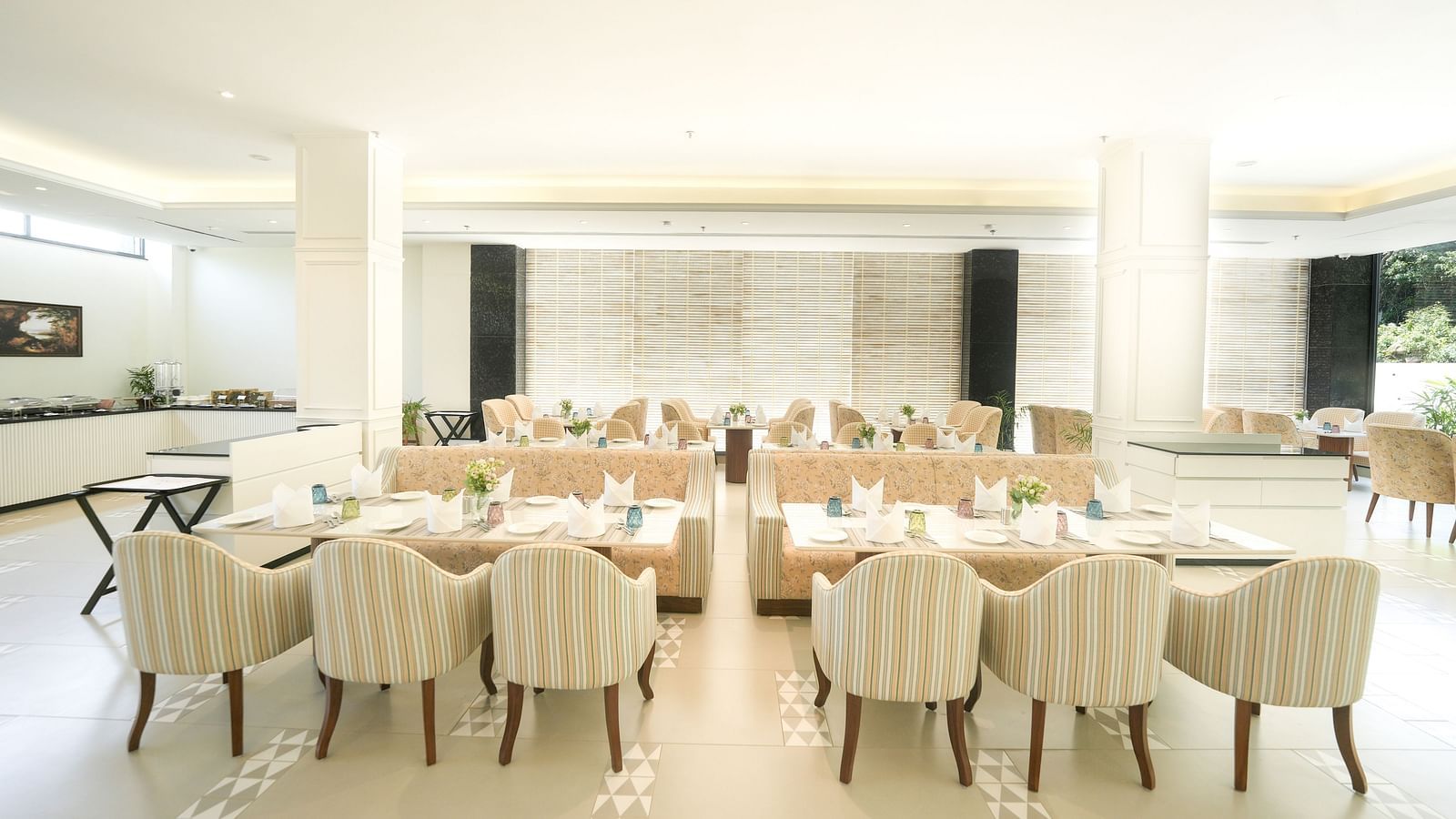 An image of our expansive restaurant in Bankhandi, featuring large dining tables, cosy furniture, and a buffet area - NAMAMI BY ZENQ BANKHANDI