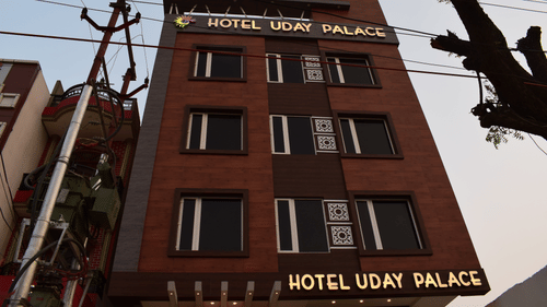 A scenic exterior view of Hotel Uday Palace, the best hotel in Varanasi, set against the sky.
