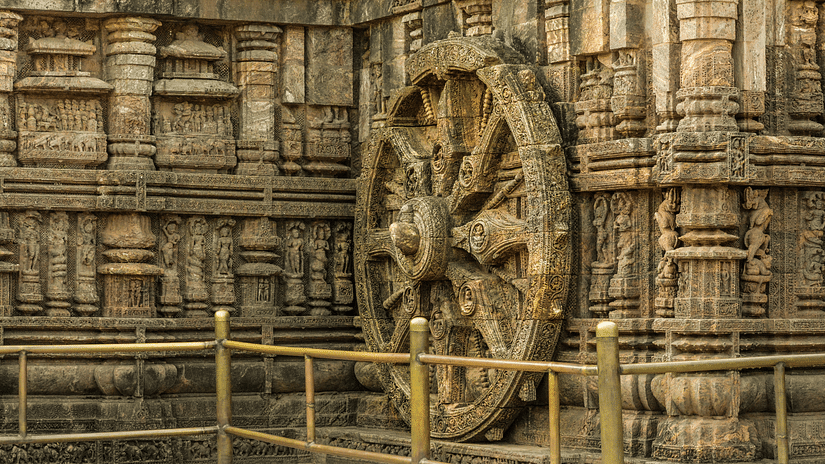 intricately carved stone wheel