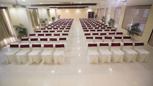 the seating arrangement at the banquet 1 - Grand Sarovar Portico Latur