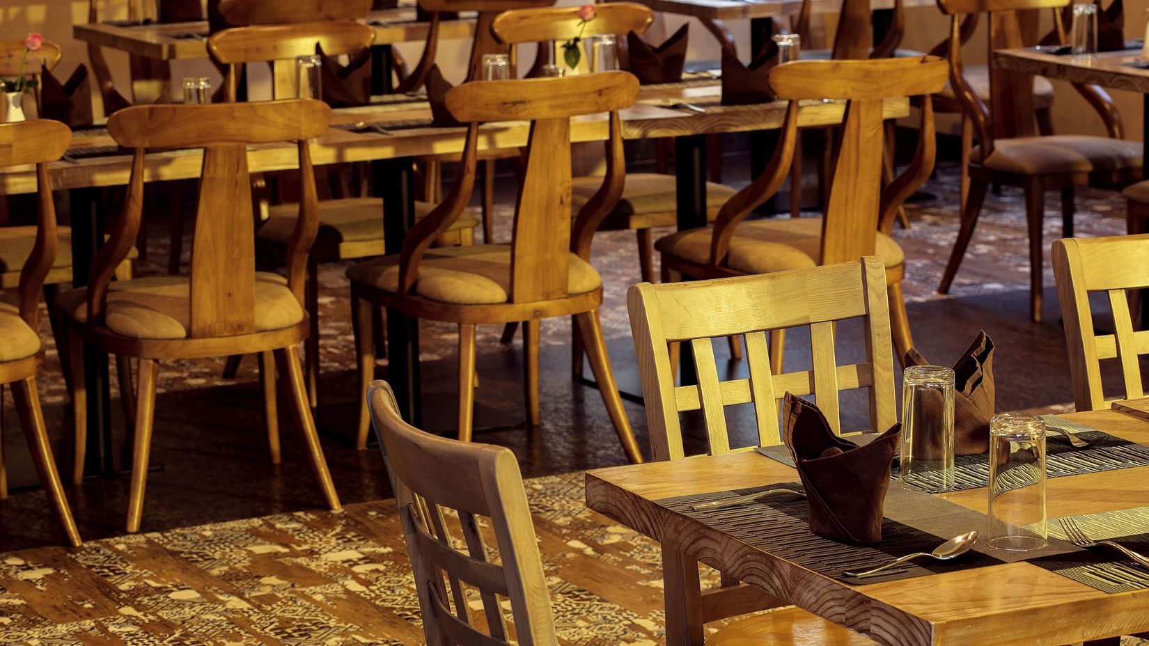 chairs at our multi-cuisine restaurant in surya city