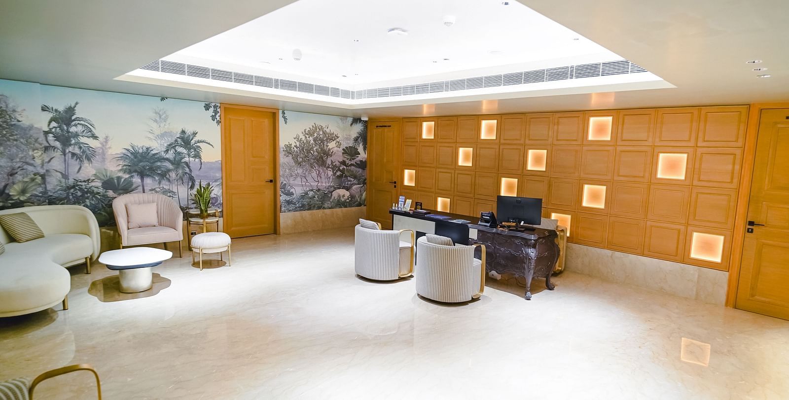 The welcoming Bodhi Spa reception area with warm lighting and a calming atmosphere - Grand Madurai by GRT Hotels