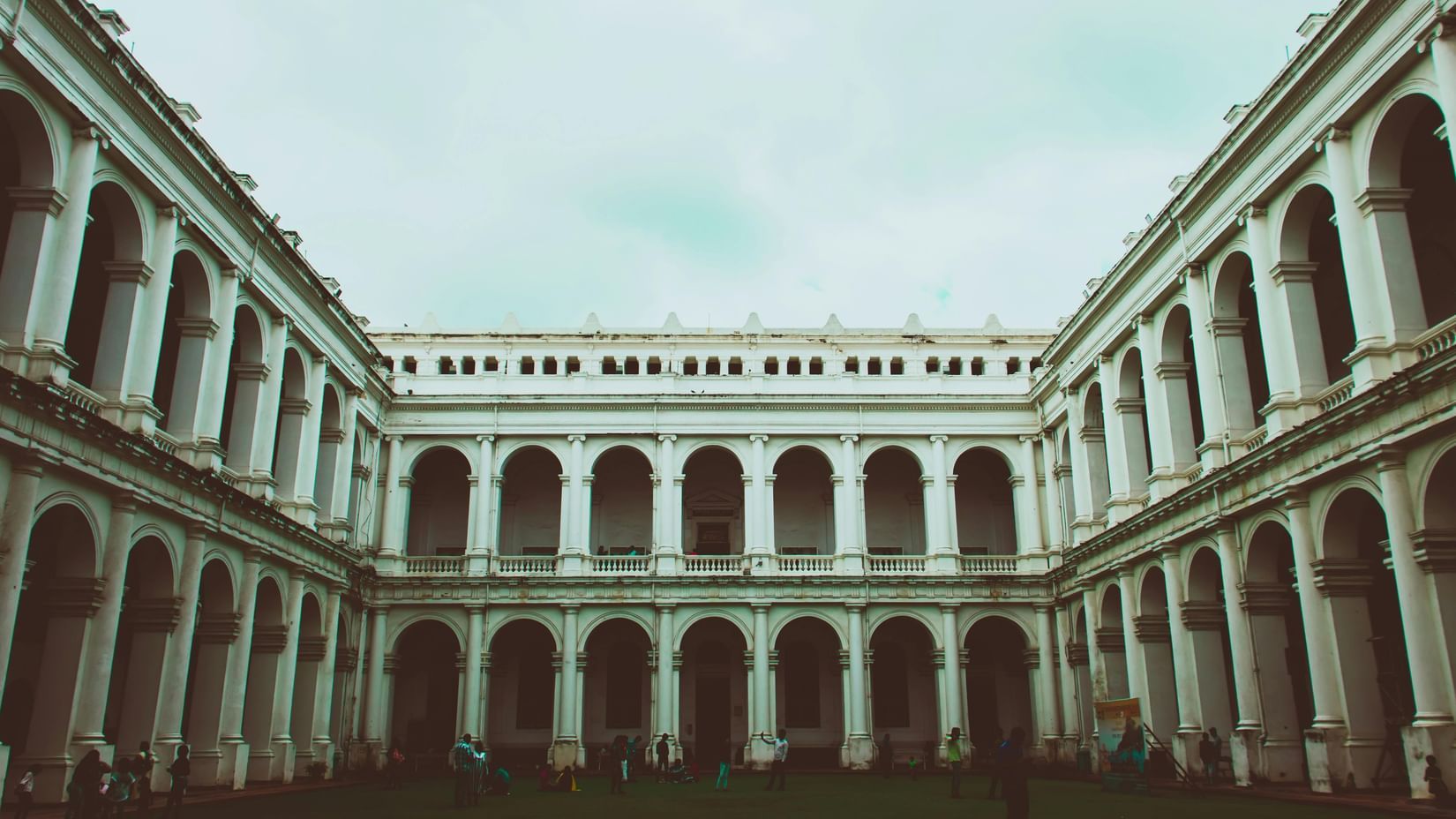 Courtyard of a grand colonial-style building.