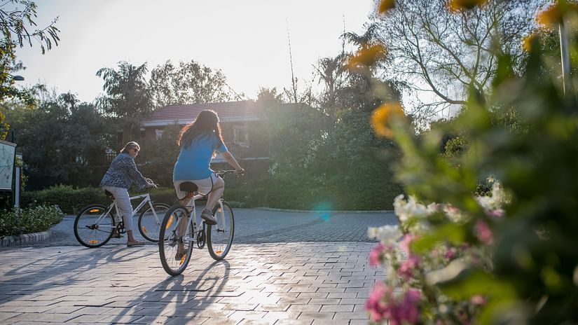 guests cycling at Karma Lakelands 3