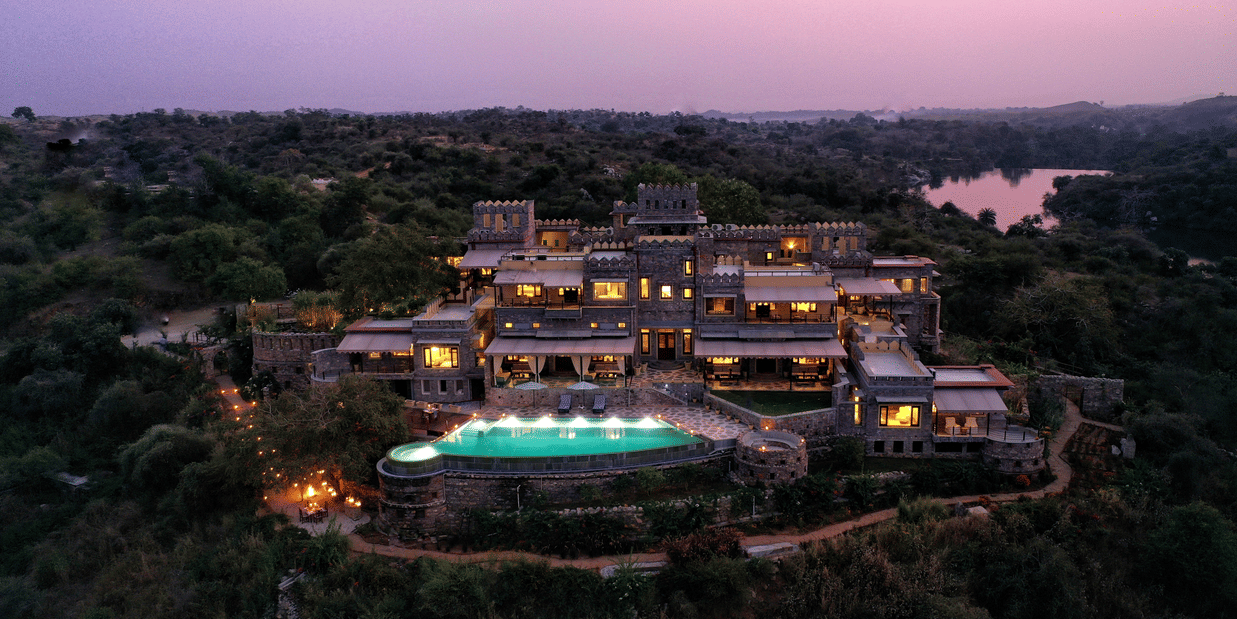 An aerial view from a drone of Chunda Shikar Oudi with the swimming pool in full view. 