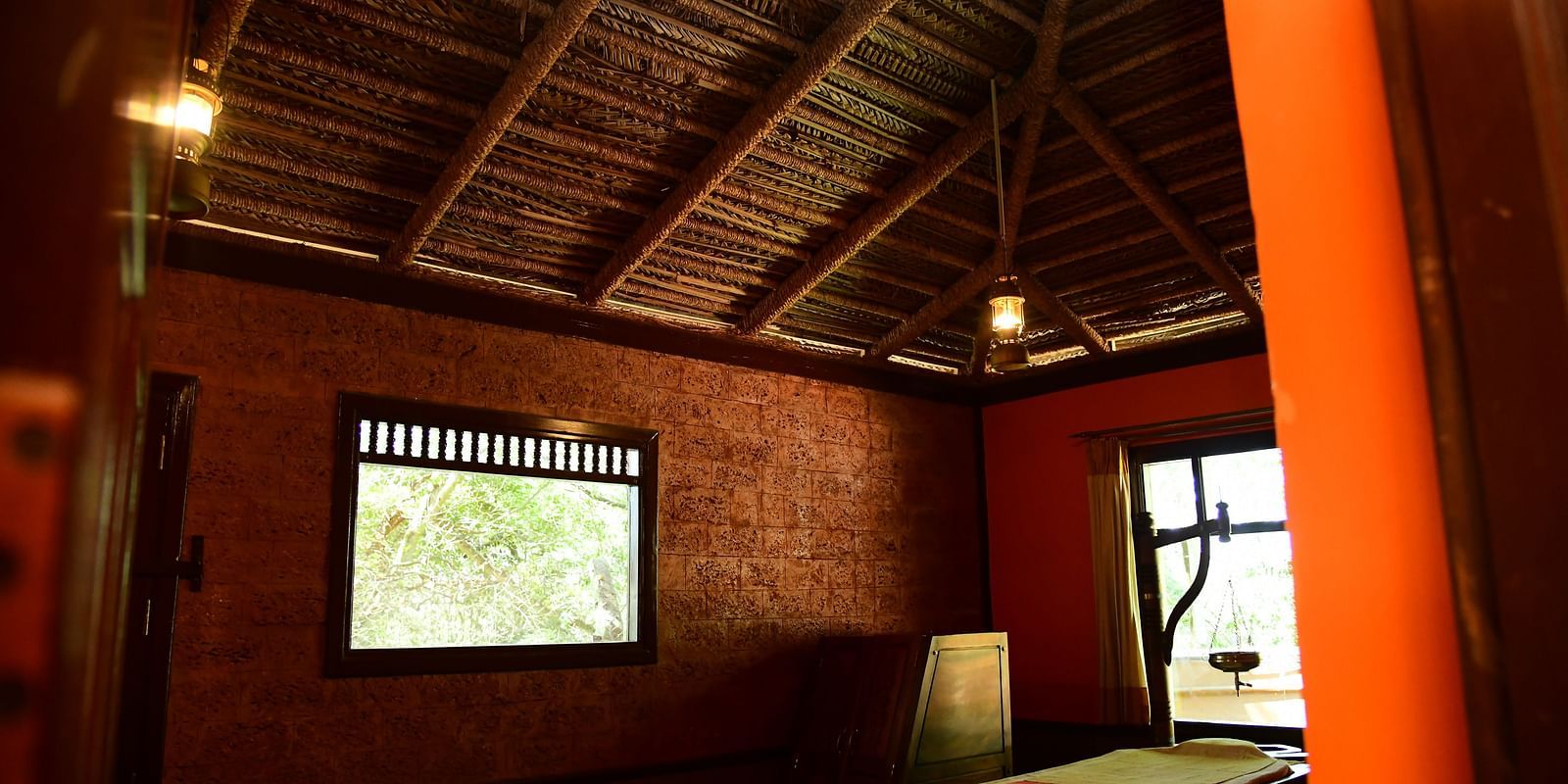 image of the ayurveda spa in hoysala village resort with two medium size windows in the room.