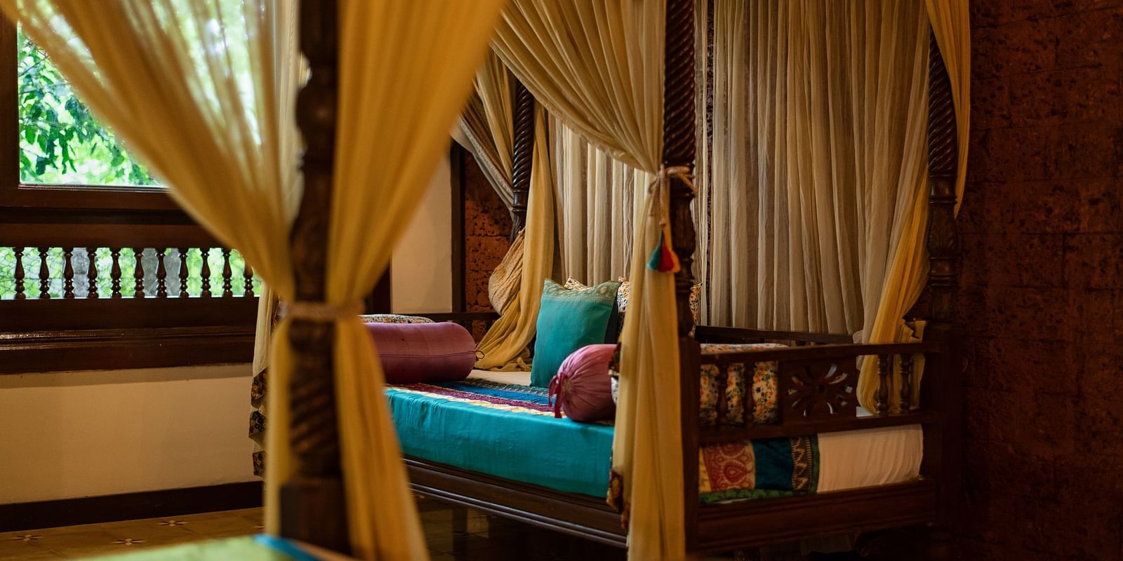 image of a sitting area at malnad palace suite at hoysala village resort, Hassan
