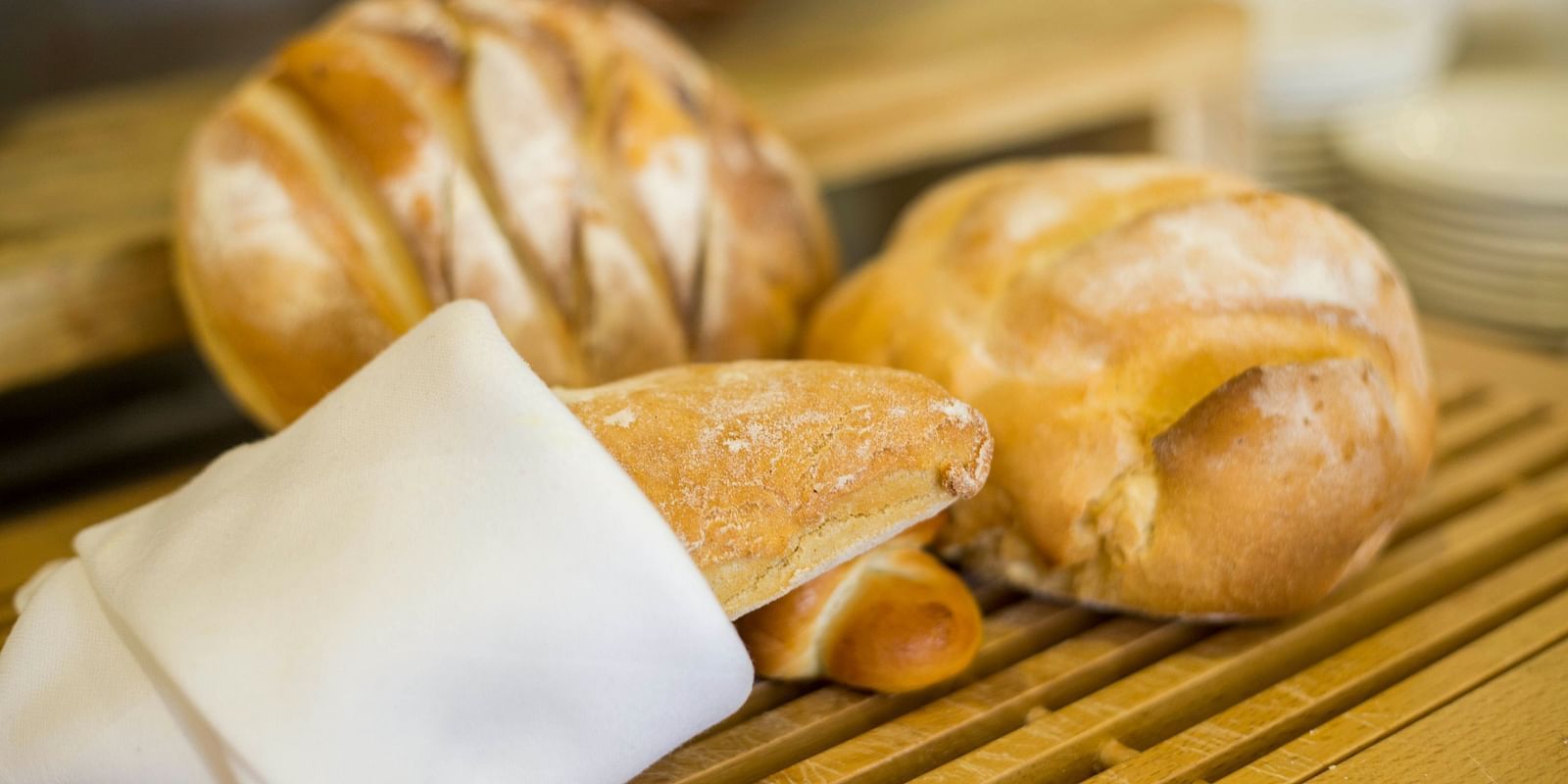 freshly baked bread displayed on the counter - restaurant in Lonavala