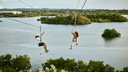 Ziplining with waters below