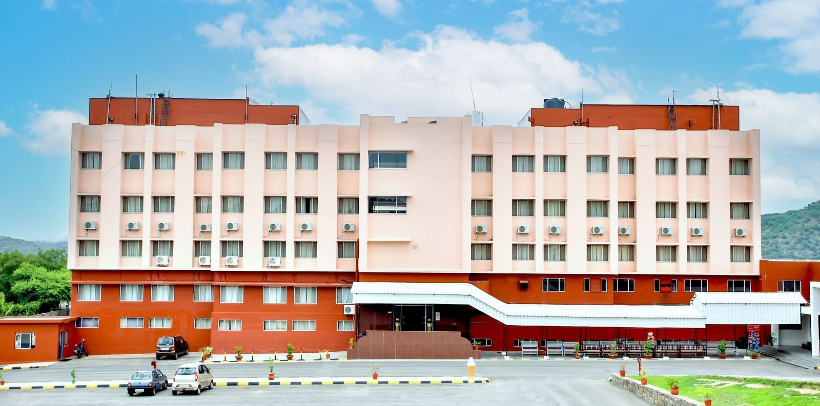 A long shot of the facade of Hotel Sahara in Ramoji Film City - Hotel Exterior in Hyderabad.