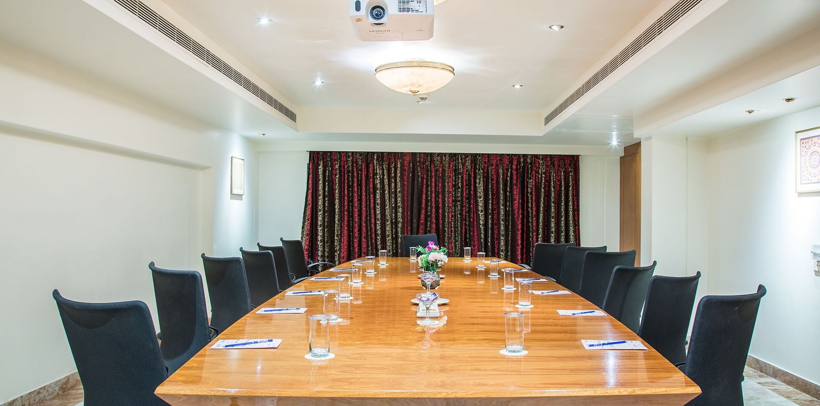 Well lit boardroom at SItara Luxury Hotel in Hyderabad near Ramoji Film City