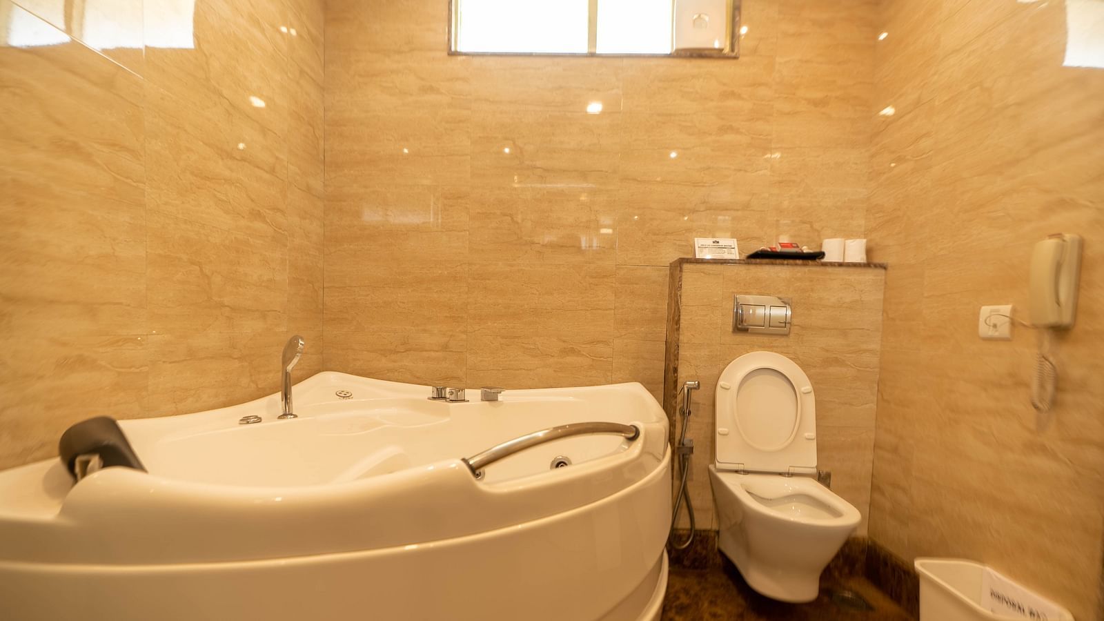 A restroom in the Suite at Hotel Pai Viceroy Jayanagar featuring a bath tub