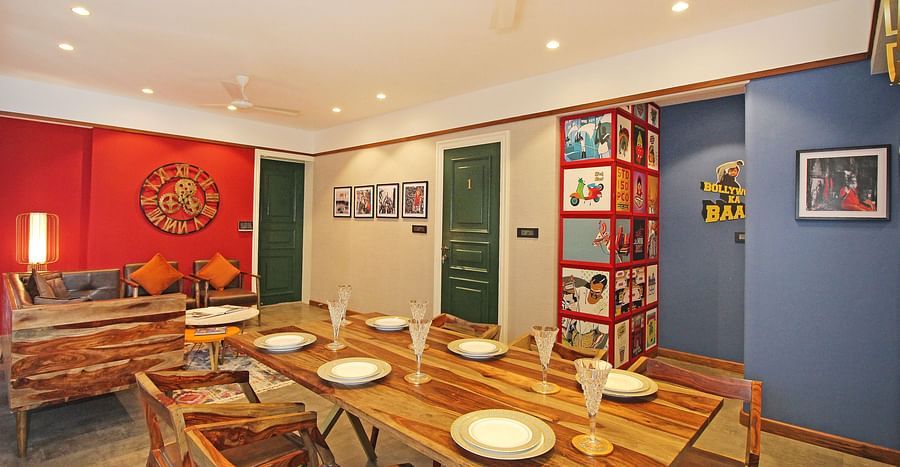 living room with fancy interiors and dining table at theory9