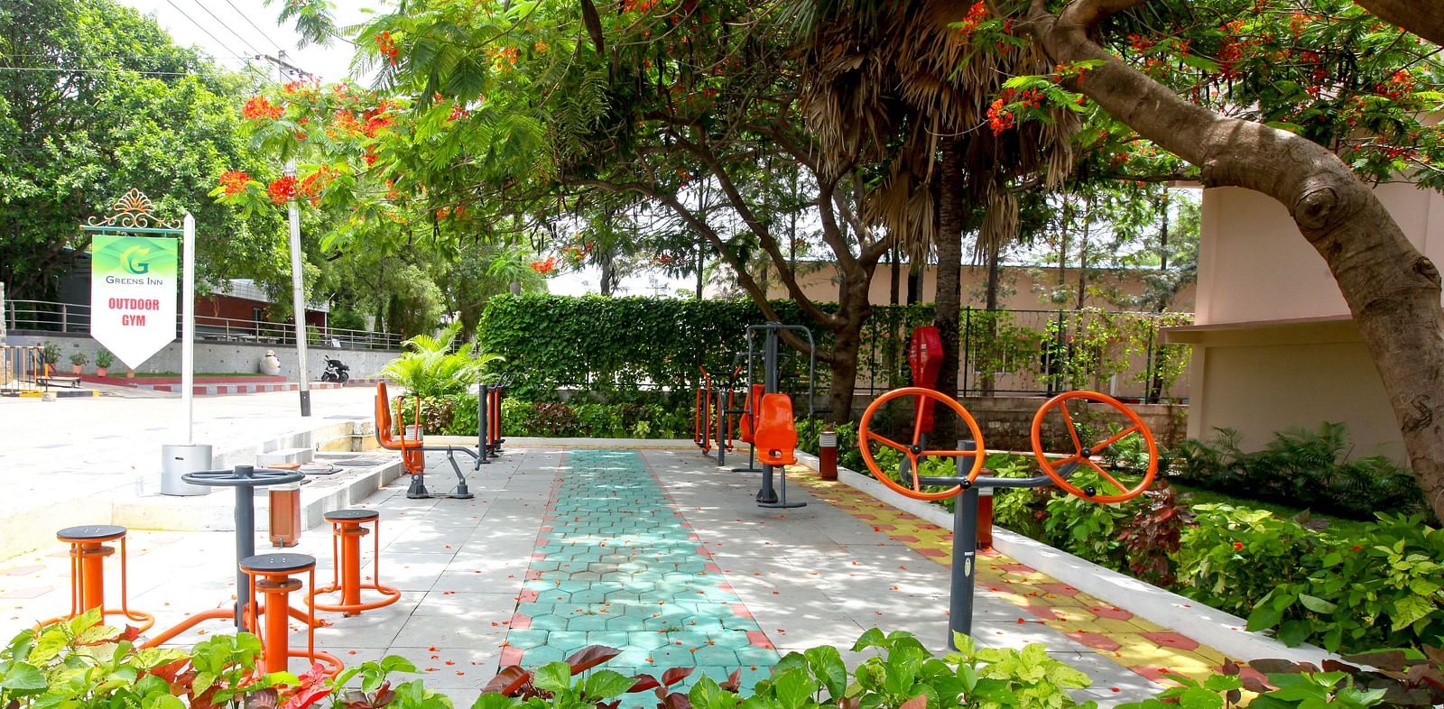 Outdoor games placed under trees at Greens Inn - Fun Activities in Hyderabad.