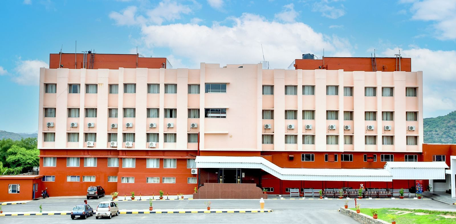 A long shot of the facade of Hotel Sahara in Ramoji Film City - Hotel Exterior in Hyderabad.